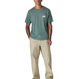 Man wearing Patagonia's 100% organic cotton 73 skyline t-shirt in pastel blue. T-shirt has relaxed fit 