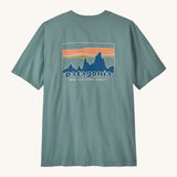 Patagonia men's 100% organic cotton 73 skyline t-shirt in pastel blue with a mountain range logo on the upper back