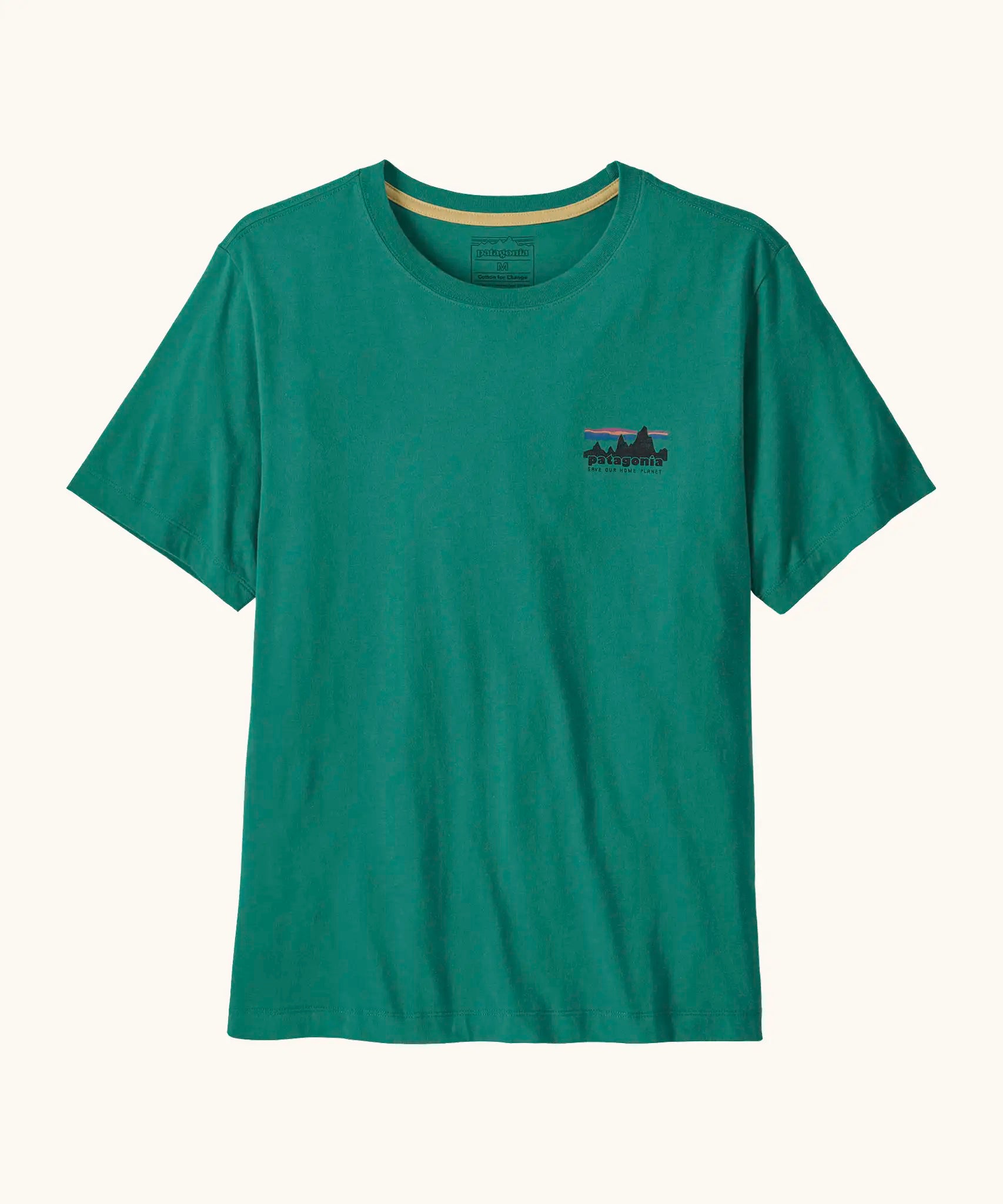Patagonia men's 100% organic cotton 73 skyline t-shirt in dark green with a small mountain range logo on the chest