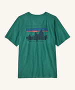 Patagonia men's 100% organic cotton 73 skyline t-shirt in dark green with a mountain range logo on the upper back
