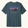 Patagonia men's 100% organic cotton 73 skyline t-shirt in dark blue with a mountain range logo on the upper back