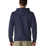 Back of wan wearing Patagonia's 73 skyline hoody in navy. Hoody has a regular fit and sits at the hips