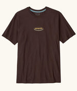 Patagonia men's 95 oval logo short sleeve t-shirt in den brown. Shows small oval brand patch on upper chest