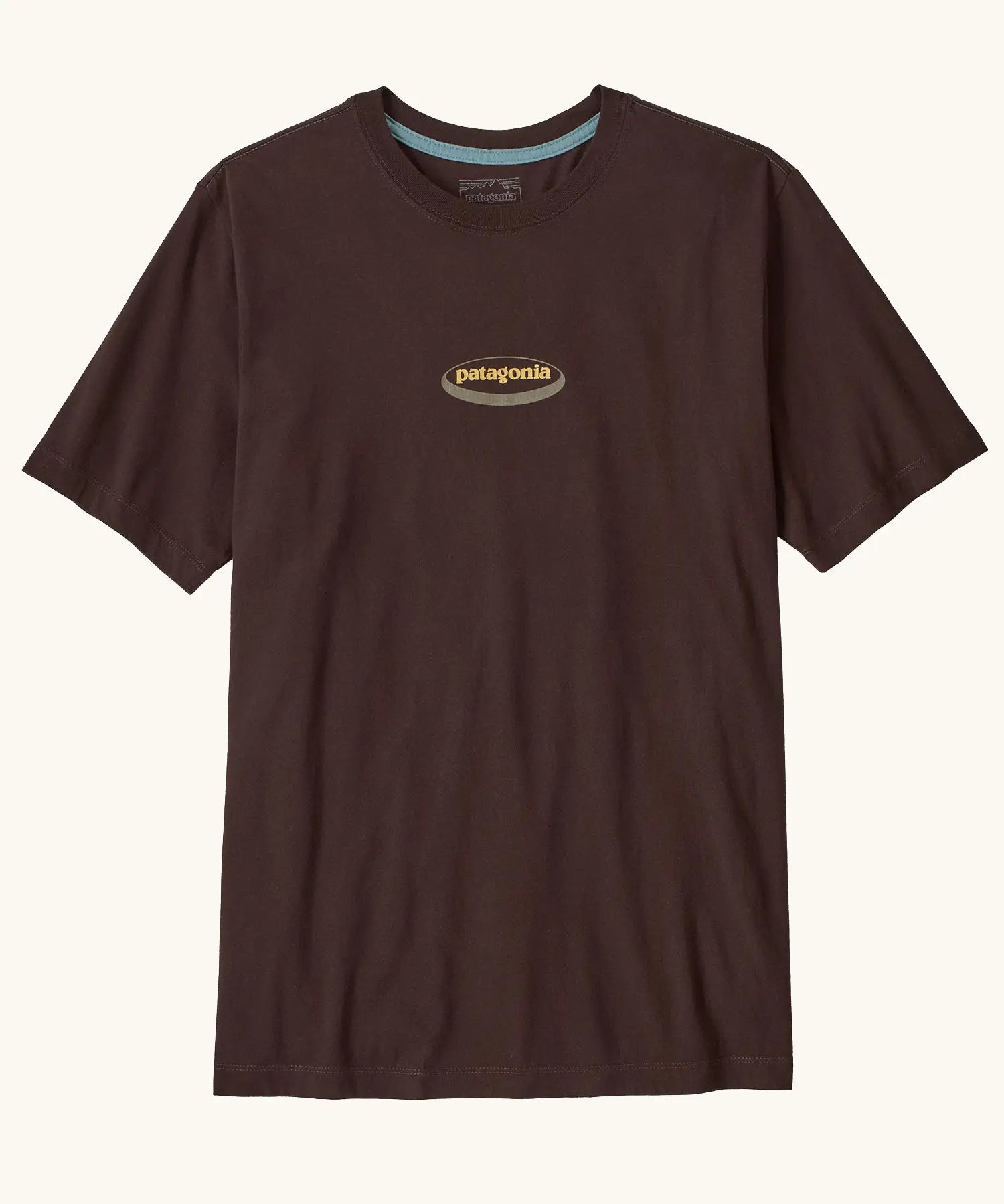 Patagonia men's 95 oval logo short sleeve t-shirt in den brown. Shows small oval brand patch on upper chest