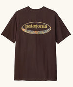 Patagonia men's 95 oval logo short sleeve t-shirt in den brown. Shows large oval brand patch on upper back