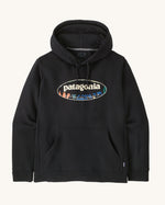 Patagonia men's 95 uprisal hoody in black with light yellow oval brand logo on the front and a pouch pocket