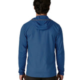 Back of man wearing Patagonia men's airshed pro pullover in blue. Top has a slim fit