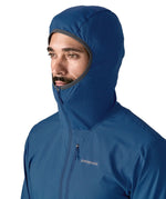 Patagonia men's airshed pro pullover in blue showing close up of the stretch fit hood