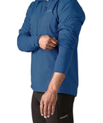 Patagonia men's airshed pro pullover in blue showing close up of the stretch fit sleeve