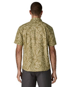 Back of man wearing Patagonia men's buttoned short sleeve shirt in light green. Shirt has relaxed fit and sits at the hips