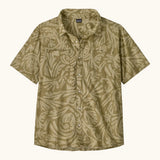 Patagonia men's buttoned short sleeve shirt in light green with repeating abstract pattern design and chest pocket
