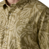 Close up of chest pocket on the Patagonia men's buttoned short sleeve shirt in light green and a repeating abstract pattern 