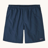 Patagonia men's baggies long 7 inch quick drying shorts in dark blue. Shows elasticated waist band and side pockets
