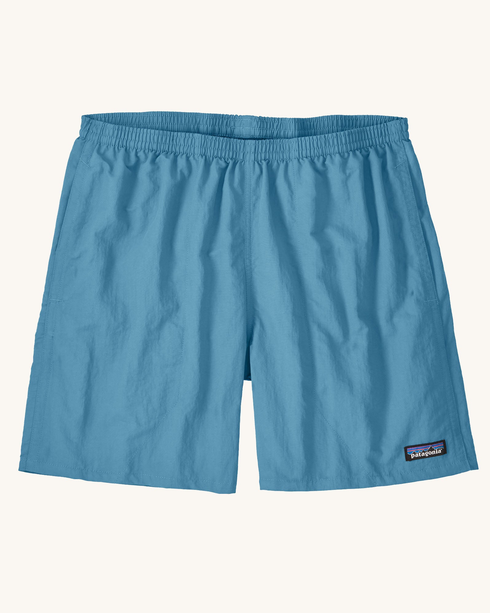 Patagonia quick drying men's baggies shorts in light blue. Shows 2 side pockets