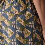 Patagonia's men's quick drying men's baggies shorts with repeating abstract tropical design. Shows back pocket with popper fastener