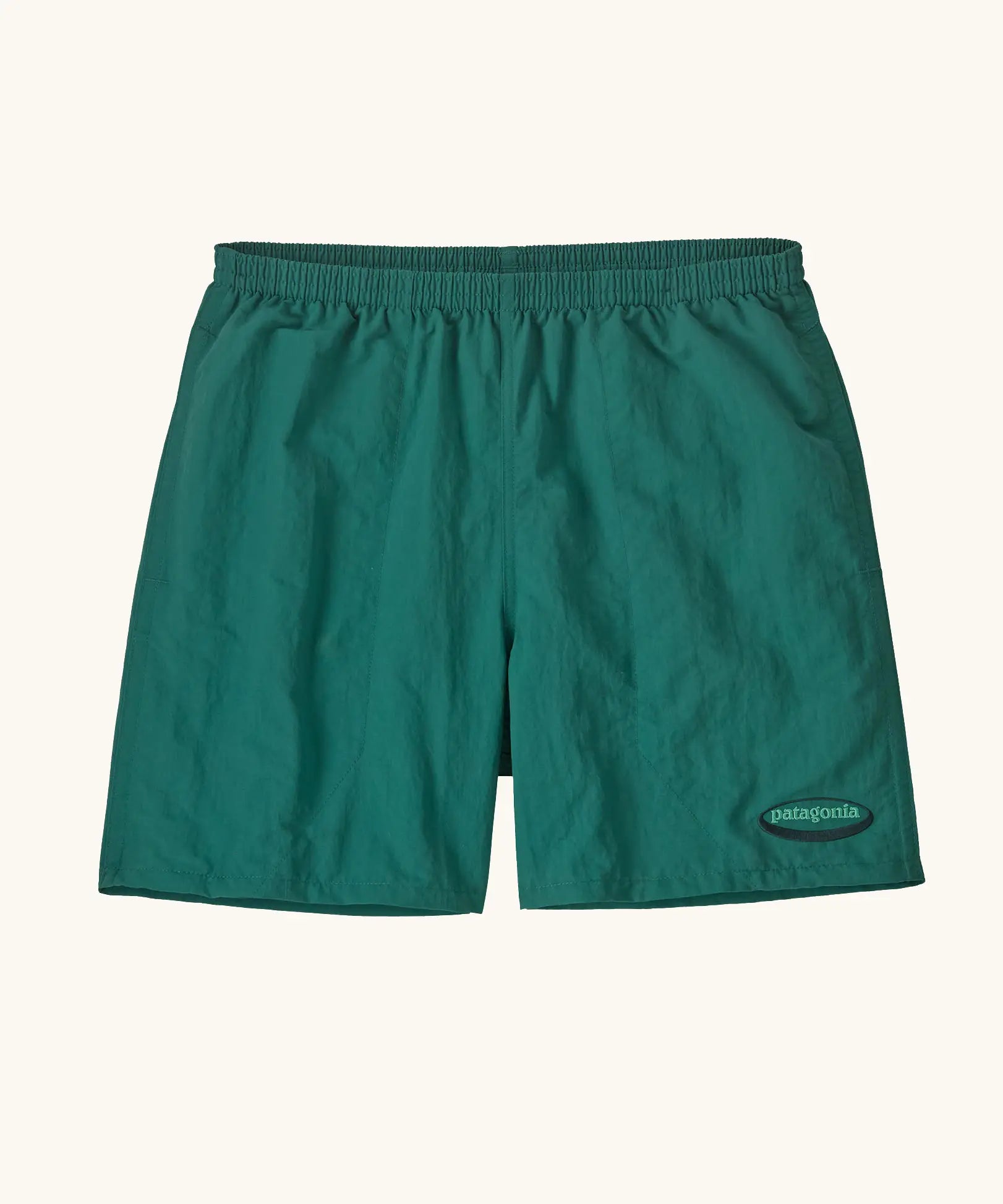 Patagonia quick drying men's baggies shorts in teal green. Shows 2 side pockets and oval logo on leg