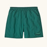 Patagonia quick drying men's baggies shorts in teal green. Shows 2 side pockets and oval logo on leg