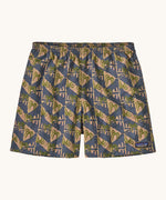 Patagonia quick drying men's baggies shorts with repeating abstract tropical design. Shows 2 side pockets