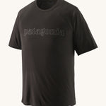 The Patagonia Men's Cap Cool Trail Graphic T-Shirt - Black. An organic cotton, adult t-shirt in black, with lack textured Patagonia text on the front of the top. On a plain background