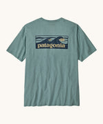 Patagonia men's boardshort responsibili tee in light blue. Shows a dark blue wave brand logo on the upper back