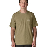 Man wearing the Patagonia's men's boardshort logo responsibili tee in light green. Shows a small pouch pocket on the chest.