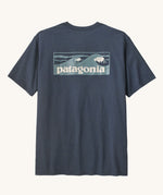 Patagonia men's boardshort responsibili tee in summit blue. Shows a blue wave brand logo on the upper back