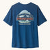 Patagonia men's capilene cool daily short sleeve t-shirt in blue with large white wave logo graphic on upper back