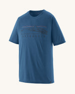 Patagonia men's capilene trail short sleeve t-shirt in blue with mountain outline graphic on upper body