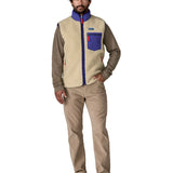 A model wearing the Patagonia mens classic retro x fleece vest available at Babipur showing the fit of the gilet