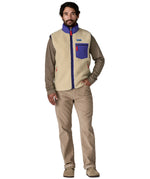A model wearing the Patagonia mens classic retro x fleece vest available at Babipur showing the fit of the gilet