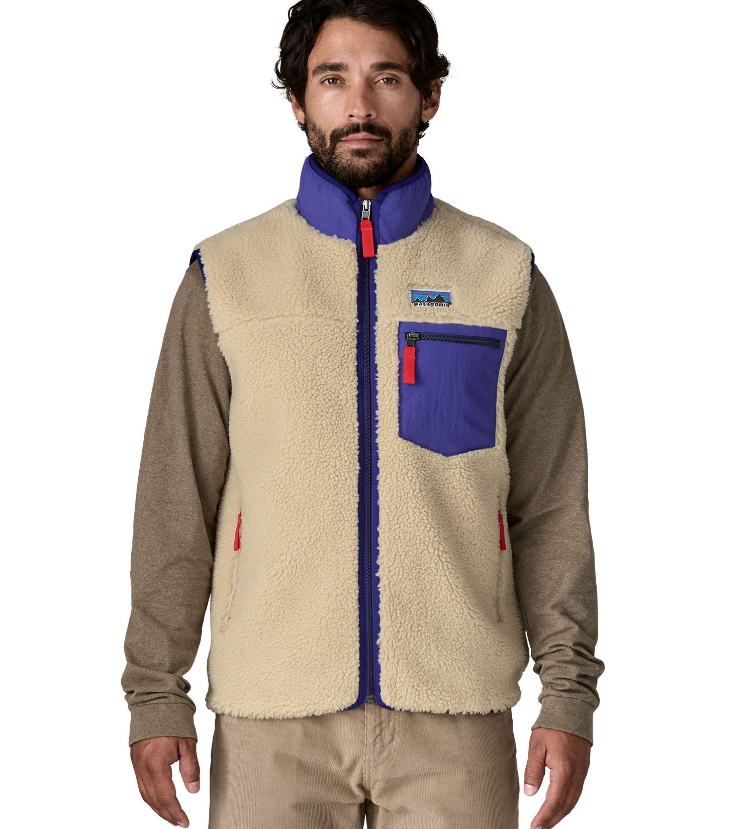 A model wearing the Patagonia mens classic retro x fleece vest available at Babipur showing the front fit of the gilet