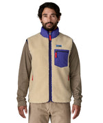 A model wearing the Patagonia mens classic retro x fleece vest available at Babipur showing the front fit of the gilet