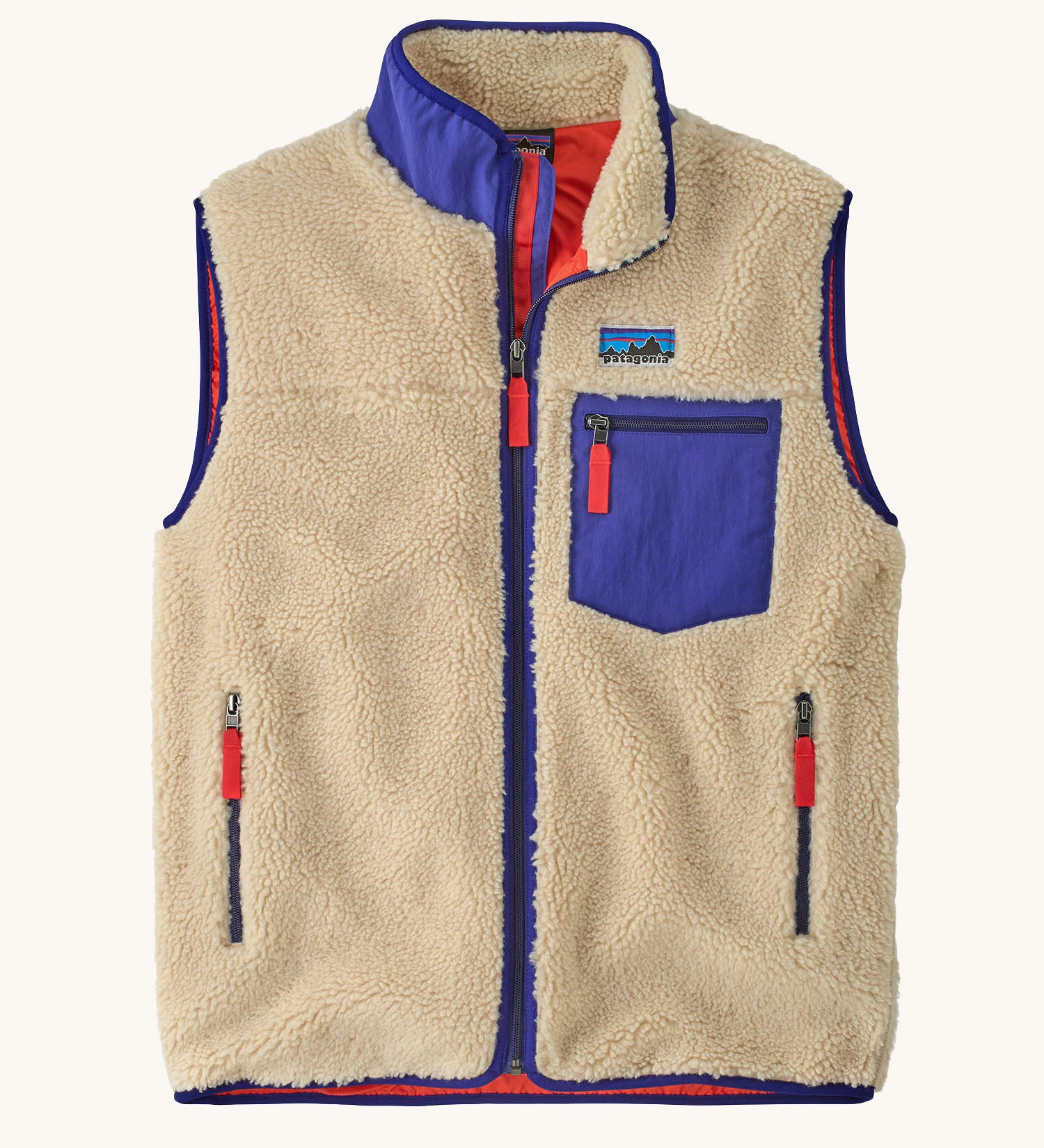 Patagonia mens classic retro x fleece vest available at Babipur. A dark beige coloured thick fleece with a royal blue trim. Features a full length zip, chest pocket and side pockets