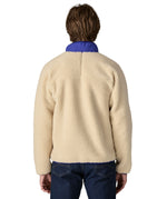 The back of the Patagonia classic retro x jacket in natural/dark navy available at Babipur. 
