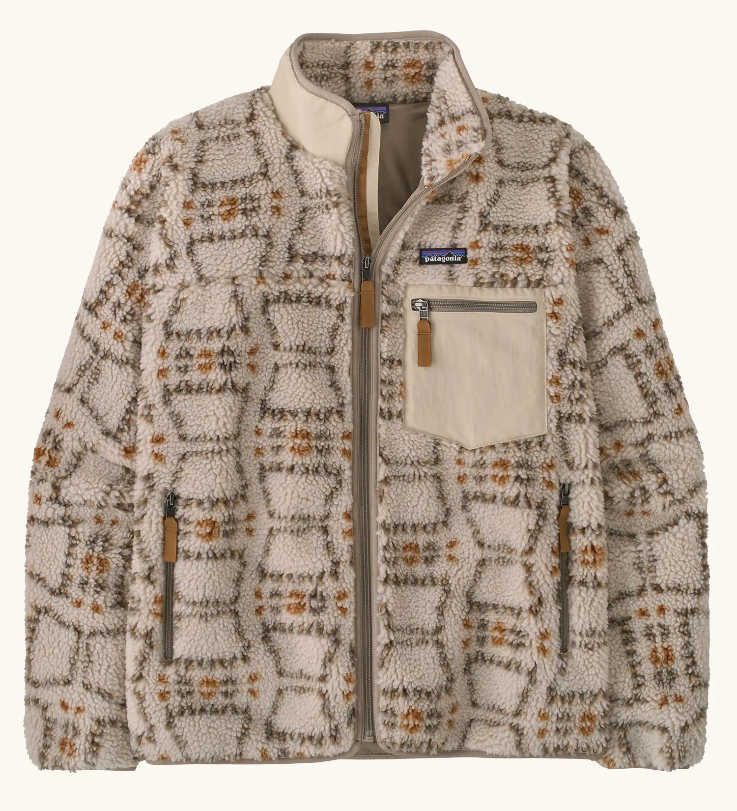 Patagonia Men’s Classic Retro-X Fleece Jacket in beige with repeating warm patterns. Features a full front zip, chest and side pockets