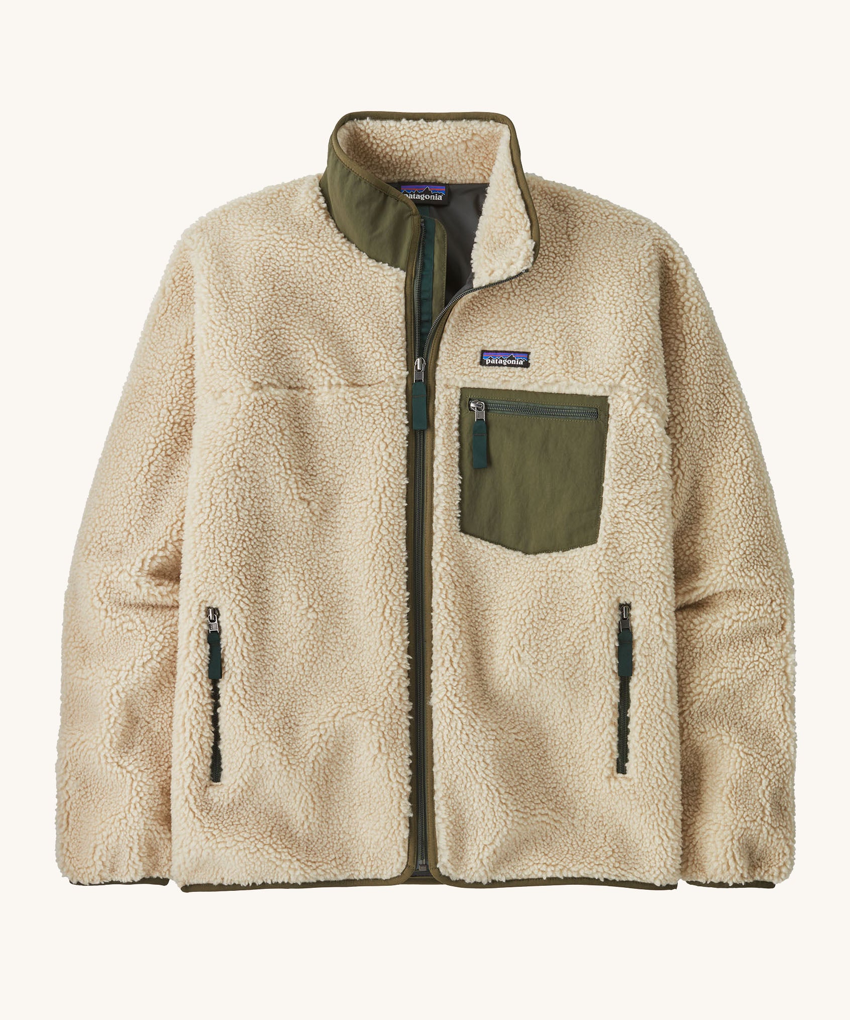 Patagonia men's thick fleece jacket in a cream colour. Features a full length front zip, side pockets and a dark green patch pocket.