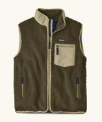 Patagonia men's classic retro x warm fleece vest in dark green with a contrast trim. Features a front zip, chest and side pockets