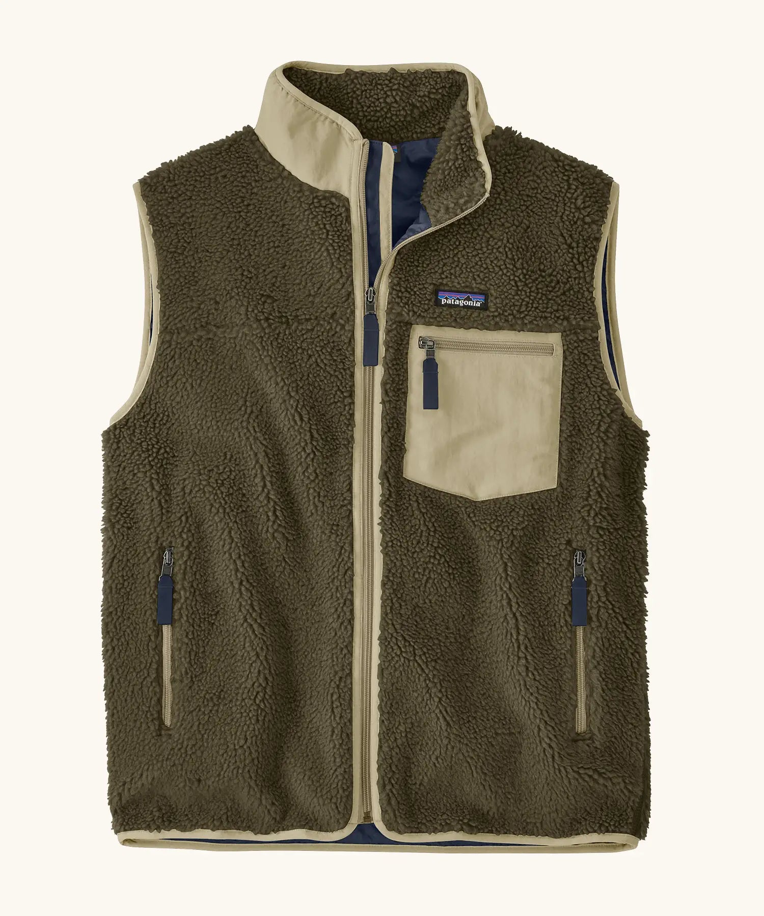 Patagonia men's classic retro x warm fleece vest in dark green with a contrast trim. Features a front zip, chest and side pockets