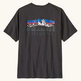 Patagonia men's fitz roy foothills short sleeve t-shirt in black  showing a large mountain branded print on the upper back. 