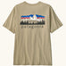 Patagonia men's fitz roy foothills short sleeve t-shirt in beige showing a large mountain branded print on the upper back. 