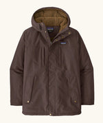 Patagonia water repellent men's Isthmus parka in den brown with a warm fleece inner lining. Features a adjustable hood and pocket. 