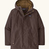 Patagonia water repellent men's Isthmus parka in den brown with a warm fleece inner lining. Features a adjustable hood and pocket. 
