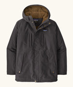 Patagonia water repellent men's Isthmus parka in ink black with a warm fleece inner lining. Features a adjustable hood and pocket. 