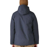 Back of man wearing Patagonia's isthmus parka jacket in dark blue. Jacket has a relaxed fit and sits at the hips