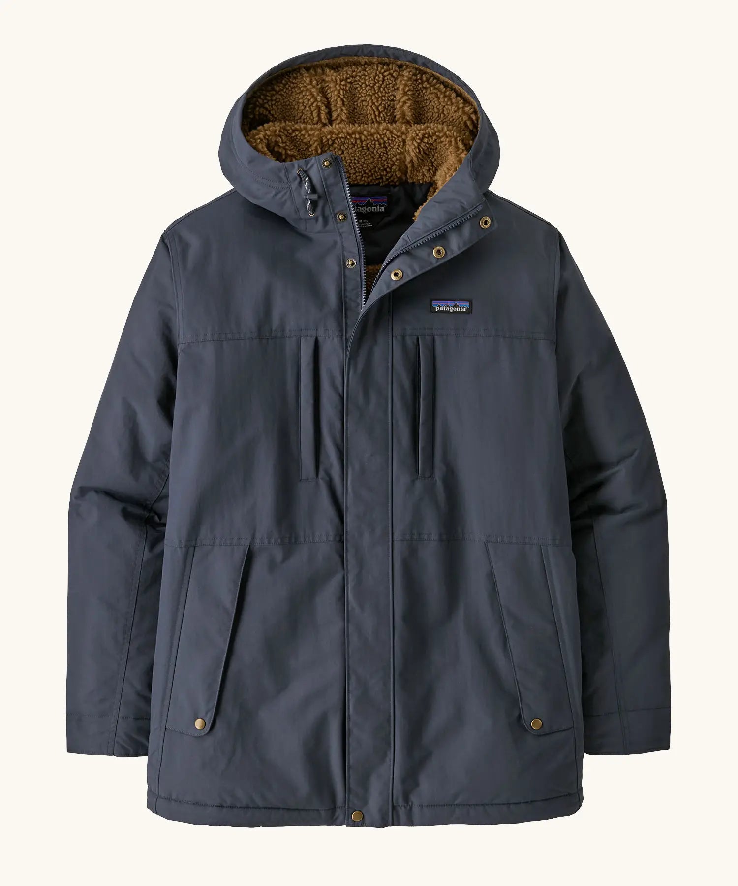 Patagonia men's isthmus parka jacket in dark blue with brown inner fleece. Showing full length front zip, side and chest pockets