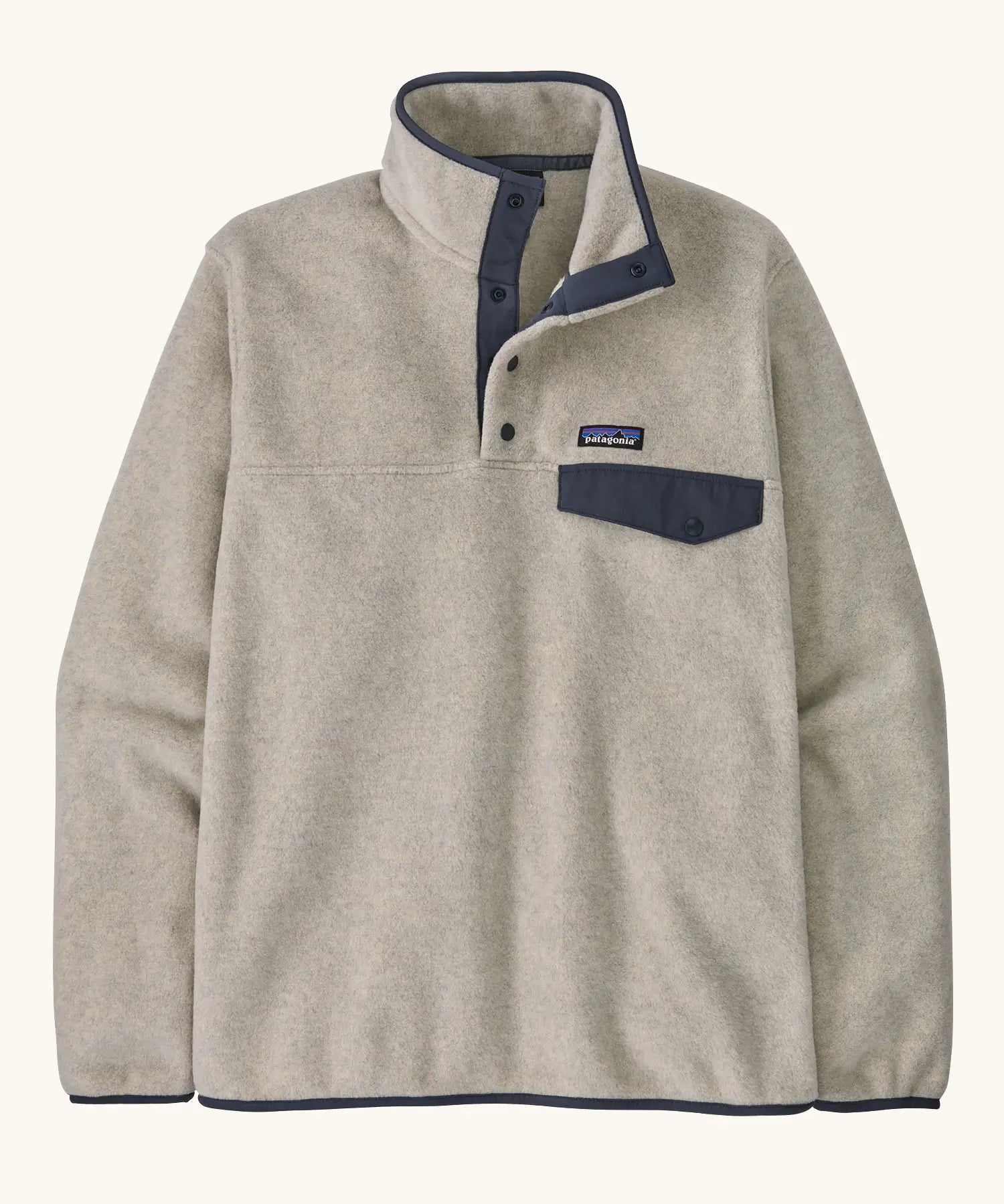 Patagonia mens lightweight synchilla snap t fleece pullover in beige with navy trim. Features 1/4 length popper fasteners and a chest pocket