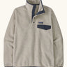 Patagonia mens lightweight synchilla snap t fleece pullover in beige with navy trim. Features 1/4 length popper fasteners and a chest pocket