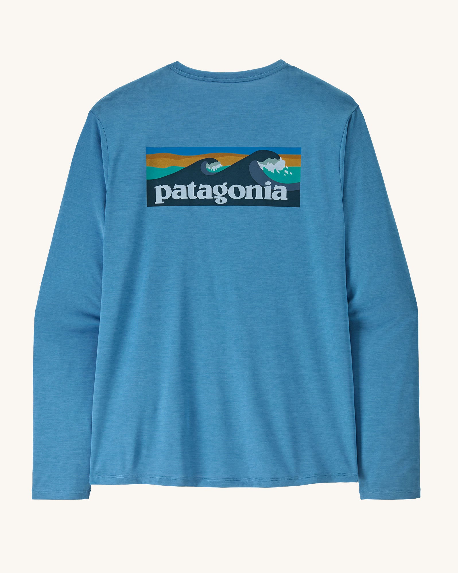 Patagonia men's long sleeve capilene cool t-shirt in light blue with wave logo graphic on upper back