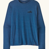 Patagonia men's long sleeve capilene techincal t-shirt in blue with small 73 skyline inspired brand print on upper chest