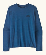 Patagonia men's long sleeve capilene techincal t-shirt in blue with small 73 skyline inspired brand print on upper chest